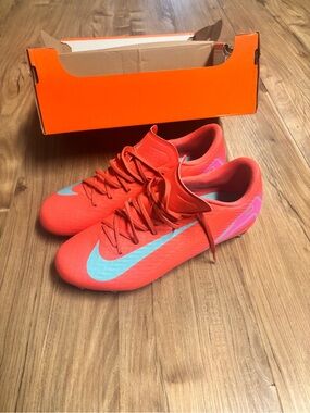 Nike Bright Red Soccer Cleats with Light Blue Swoosh